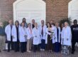 DRCOM Students and Staff celebrate our most recent SUM 2026 graduating class.